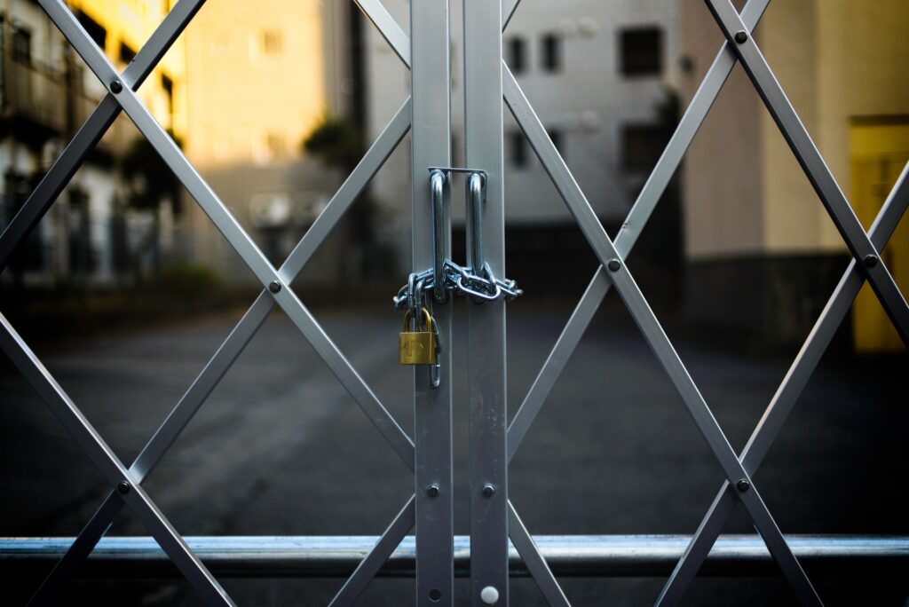 A security gate in front of the facility to represent the topic of benefits of security gates for commercial properties